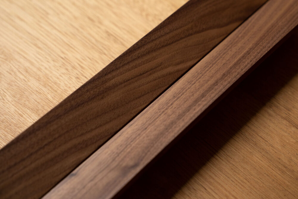 Timber linear joinery handle in Walnut by IN-TERIA
